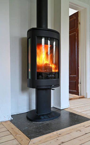 istock cast iron stove standing tall in livingroom 1283449453