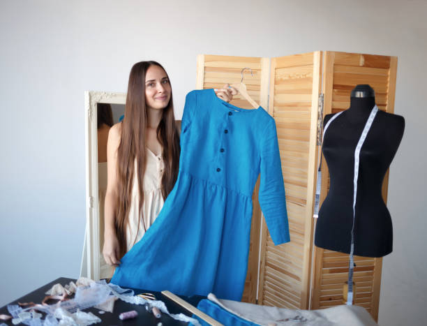 istock beautiful seamstress trying on a new product 1283452062