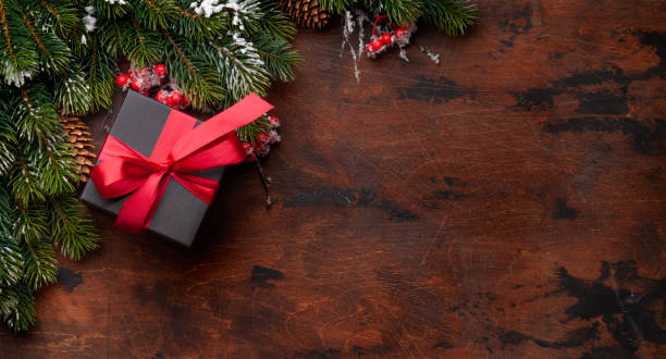 istock Christmas greeting card with fir tree and gift box 1283454568