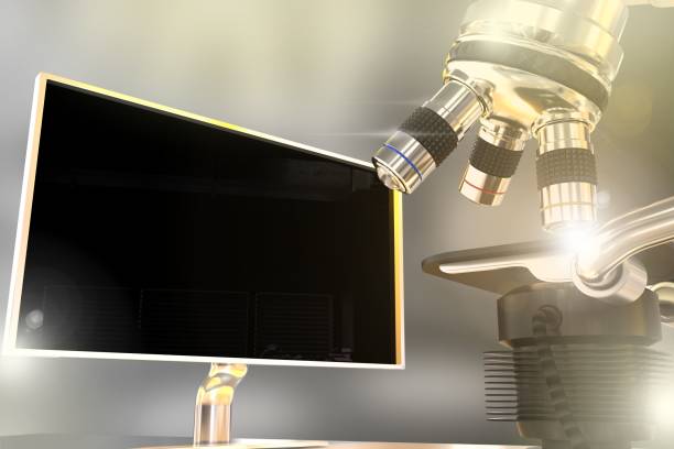 istock pharmaceutical work concept, lab electronic microscope and monitor with blank space for your content with flare on bokeh background - object 3D illustration 1283455797