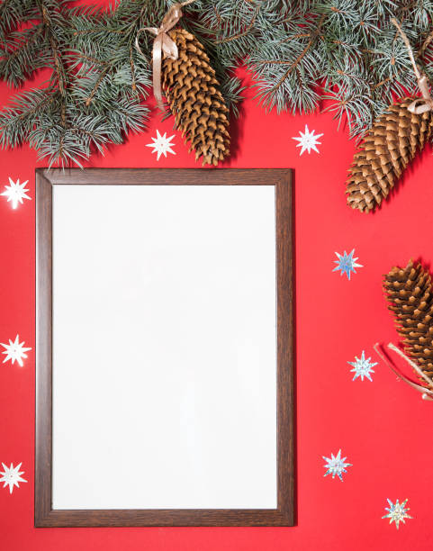 istock Christmas background with wooden frame and cones. 1283455811