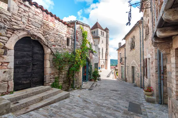 Photo of bricked houses along the beautiful streets of st cirq lapopie