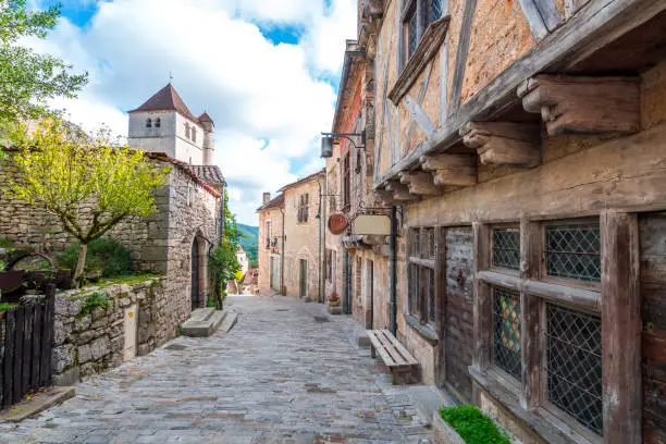 Photo of bricked houses along the beautiful streets of st cirq lapopie