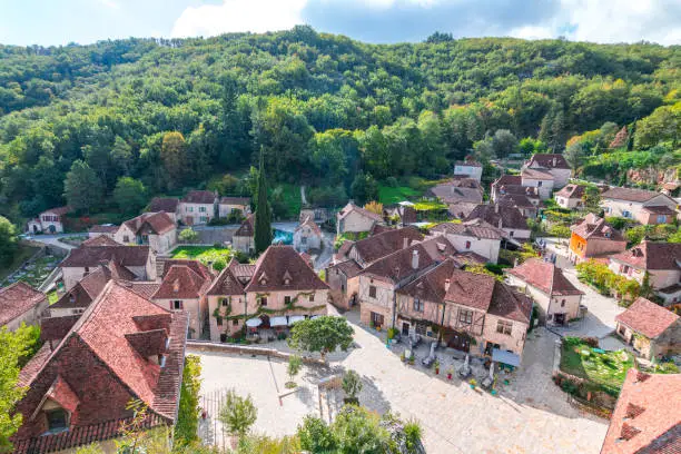 Photo of bricked houses along the beautiful streets of st cirq lapopie