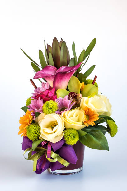 istock Flower arrangement in a purple vase 1283462981