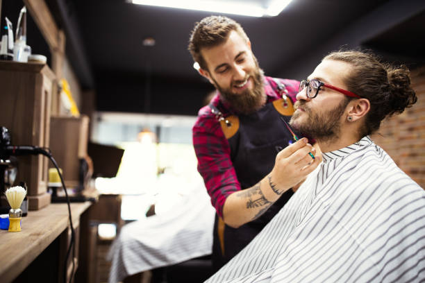 istock Client during beard and moustache grooming in barber shop 1283467635
