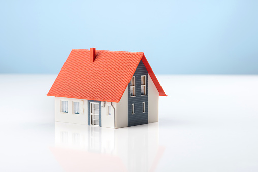Model house on blue background high quality and high resolution studio shoot