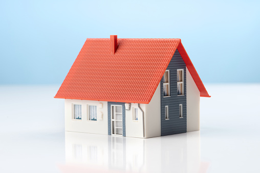 Model house on blue background high quality and high resolution studio shoot