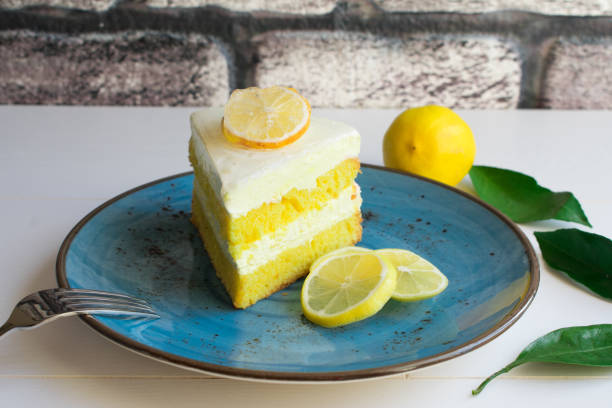 lemon cream cake lemon cream cake, close-up, delicious cake cream cake stock pictures, royalty-free photos & images