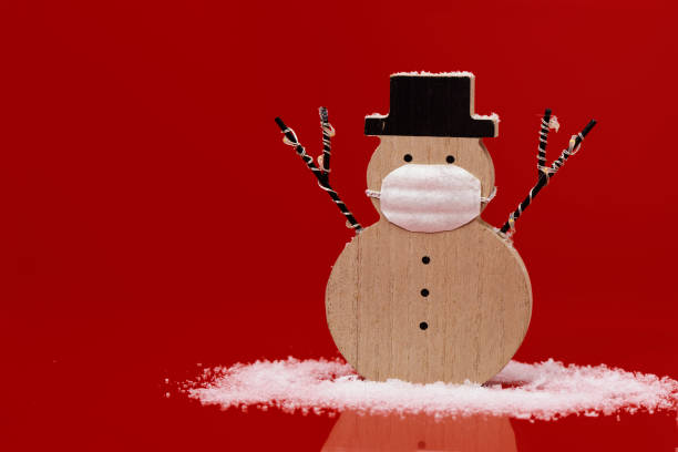 snowman wearing a face mask