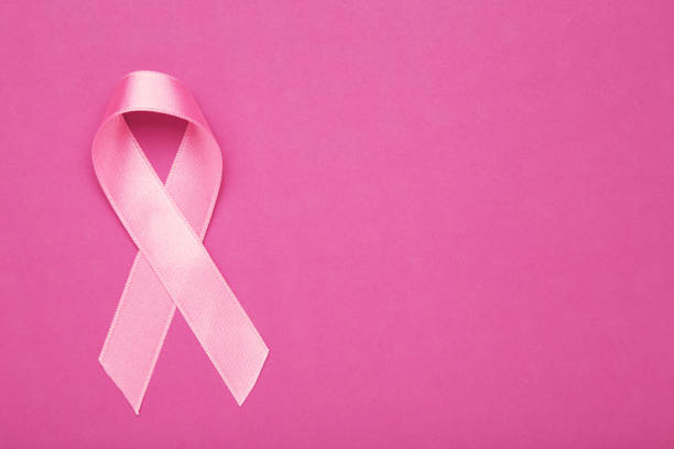 istock Breast cancer concept. Pink ribbon 1283477746