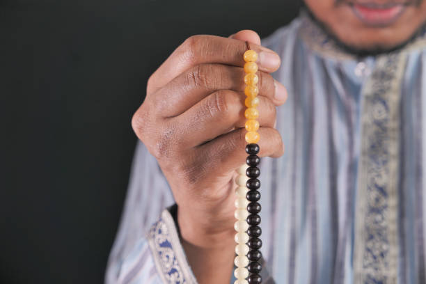 istock muslim man praying during ramadan, Close up 1283478216