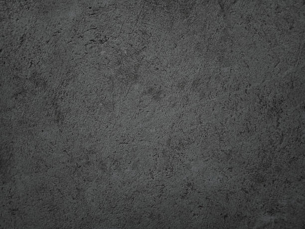 istock Dark cement wall background in vintage style for graphic design 1283479095