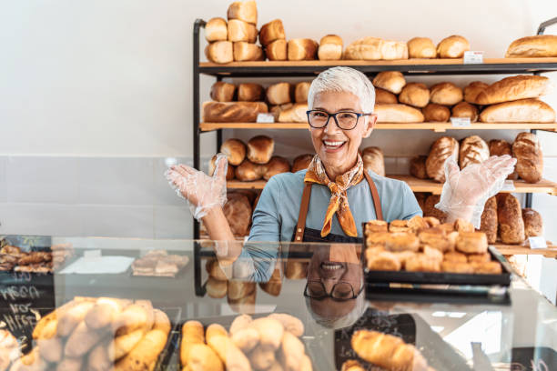 istock Portrait of a beautiful waitress working at a cafe 1283480875