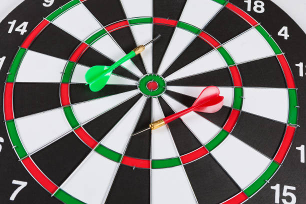 istock close up target and two color darts,competition concept 1283482601
