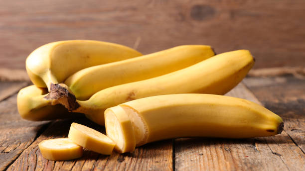 istock fresh banana on wood background 1283482736