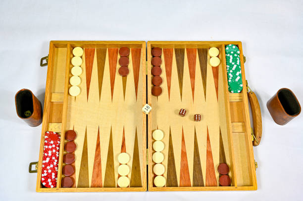 istock backgammon board with game pieces markers and dices 1283485638