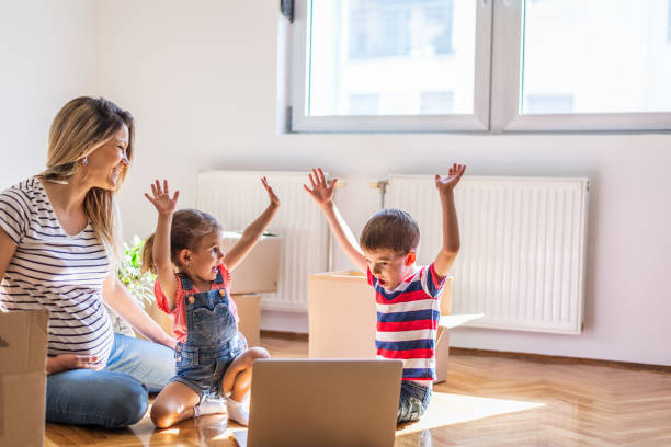 istock Family moving into new home 1283485800