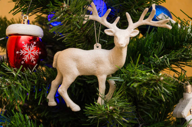 istock christmas tree with ornaments and gifts 1283486123