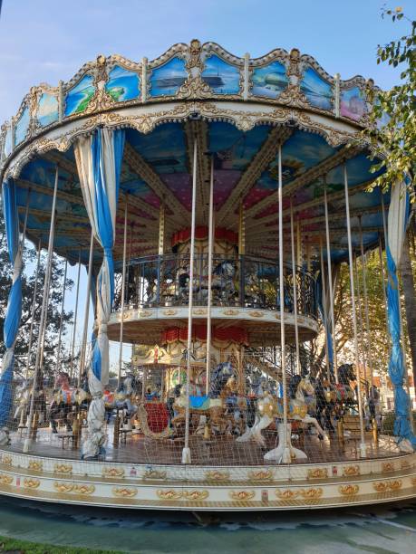 istock carousel for children in the park 1283487519