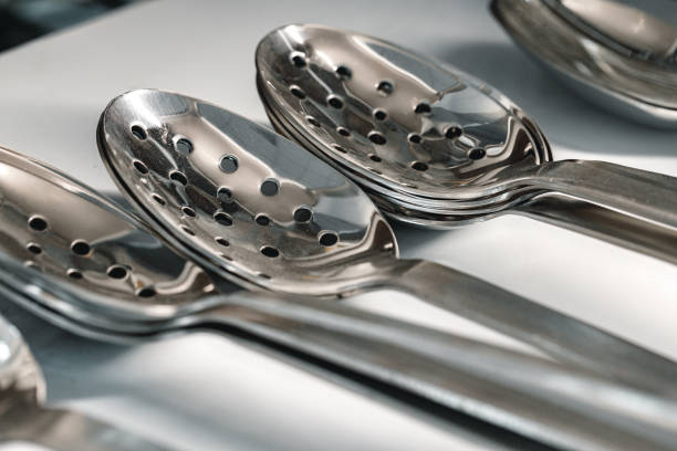 istock New metal kitchenware in a row close up 1283489054