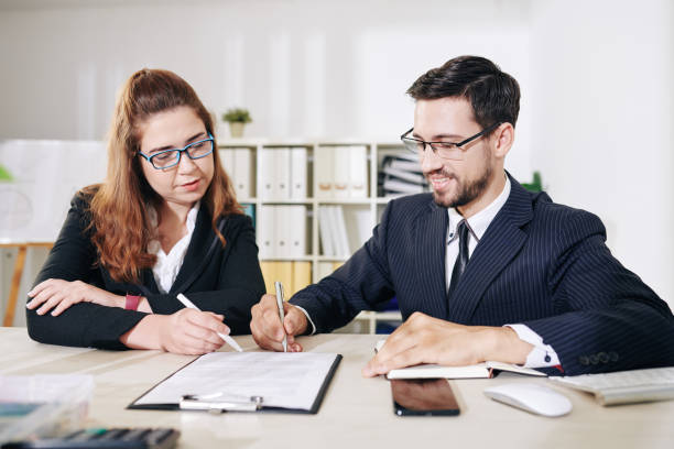 istock Business partners discussing contract 1283489727