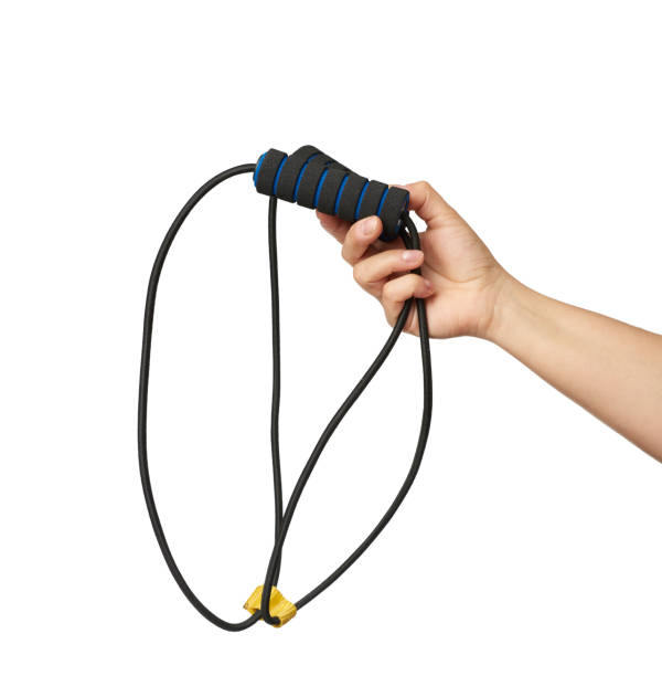 istock female hand holding hand expander for sports 1283489749