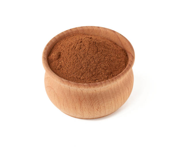 istock ground cinnamon in a wooden bowl isolated on white background 1283489787