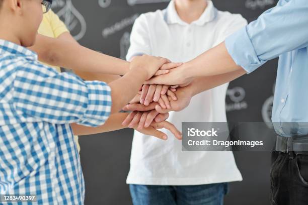 School Team At Science Competiton Stock Photo - Download Image Now - 10-11 Years, 12-13 Years, 25-29 Years