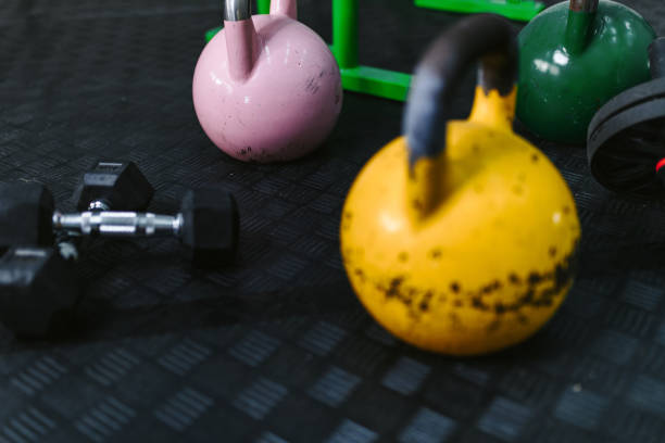istock Weights on the floor a the gym 1283491646