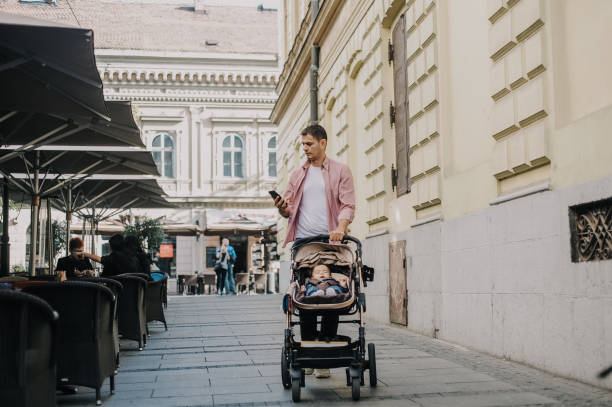 istock Handsome father spending time with his baby boy outdoors 1283493351