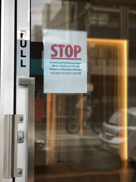 istock Closed sign in a shop front 1283494467