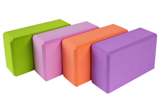 istock four colored blocks for yoga, lie side by side, concept, on a white background 1283494846