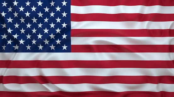 Stars and stripes american flag on a white background, top view, copy space. The pride of the American people. Symbol of independence, freedom and patriotism in the USA