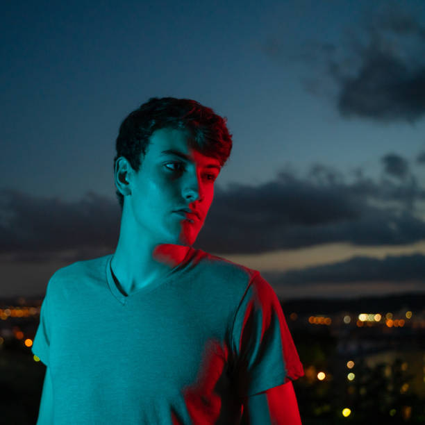 istock Young man with city views at night 1283498449