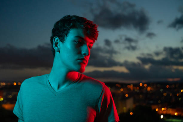 istock Young man with city views at night 1283498454