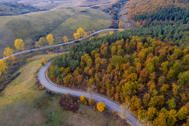 istock road drone view in autumn 1283499506