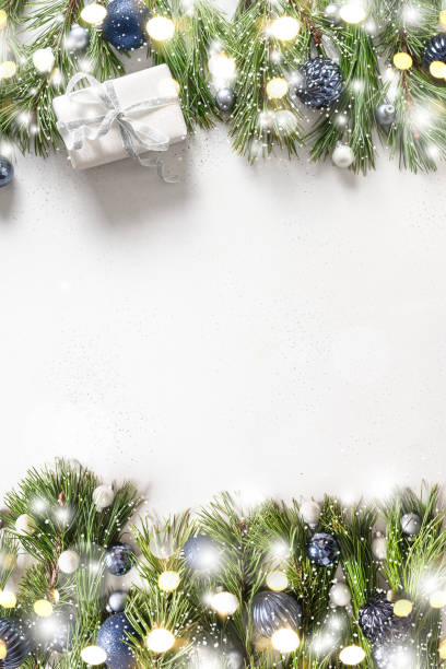 istock Christmas with gift, fir branches on white . Xmas greeting card with copy space. 1283499924