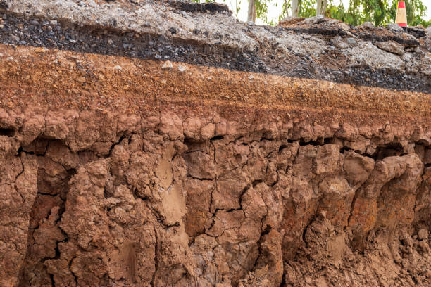 istock Soil under the road, which has been eroded in the countryside. 1283500223