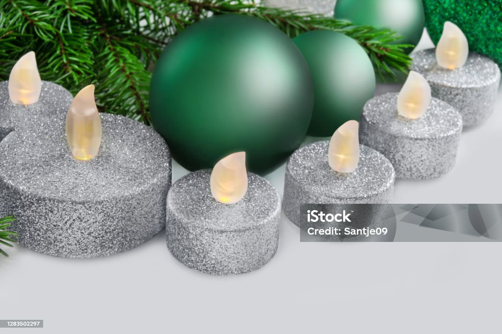 LED candles and green Christmas decoration Candle Stock Photo