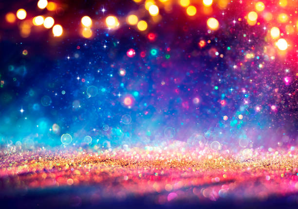 istock Shiny Golden Glitter With Lights On Blue Background 1283502984