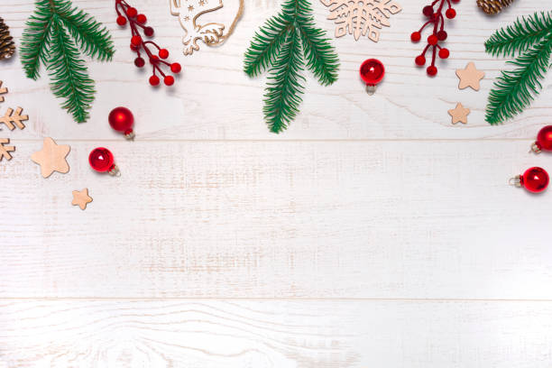 istock Christmas frame with decorations on wooden background 1283505277
