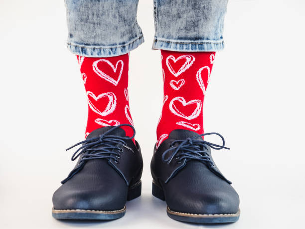 istock Men's legs, trendy shoes and bright socks 1283506743