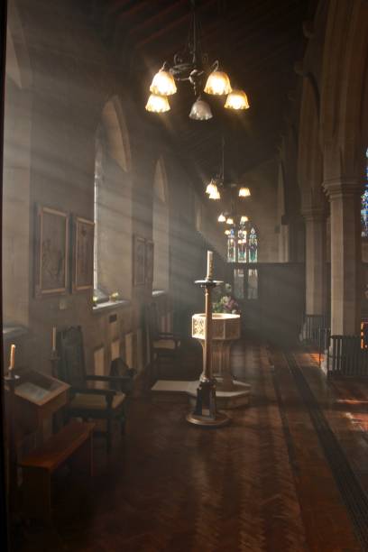 istock Church font and sunlight through windows 1283507807