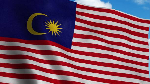 istock Malaysia flag waving in the wind, blue sky background. 3d rendering 1283509514