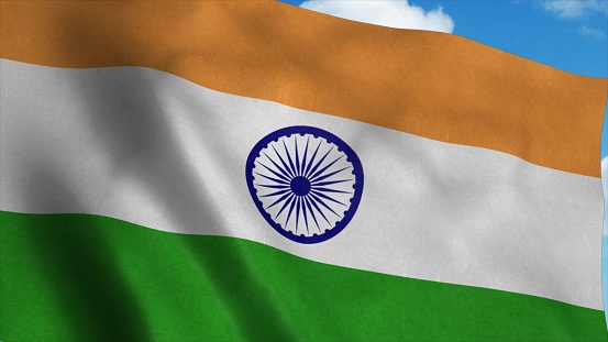 The national flag of India waving in the wind, blue sky background. 3d rendering.