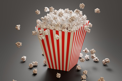 Fluffy popcorn in stripped bucked. 3D rendered illustration.