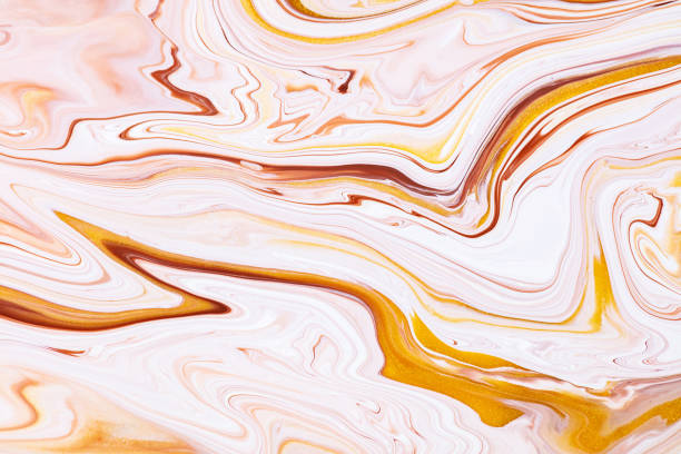 istock Fluid art texture. Abstract backdrop with swirling paint effect. Liquid acrylic picture with flows and splashes. Mixed paints for website background. Golden, brown and white overflowing colors. 1283511270