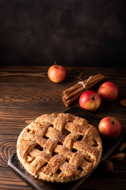 istock apple pie with autumn apples and cinnamon on a wooden table 1283514655