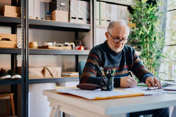 istock Senior man running small delivery business 1283517459